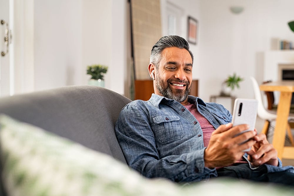 Male reading financial wellbeing information