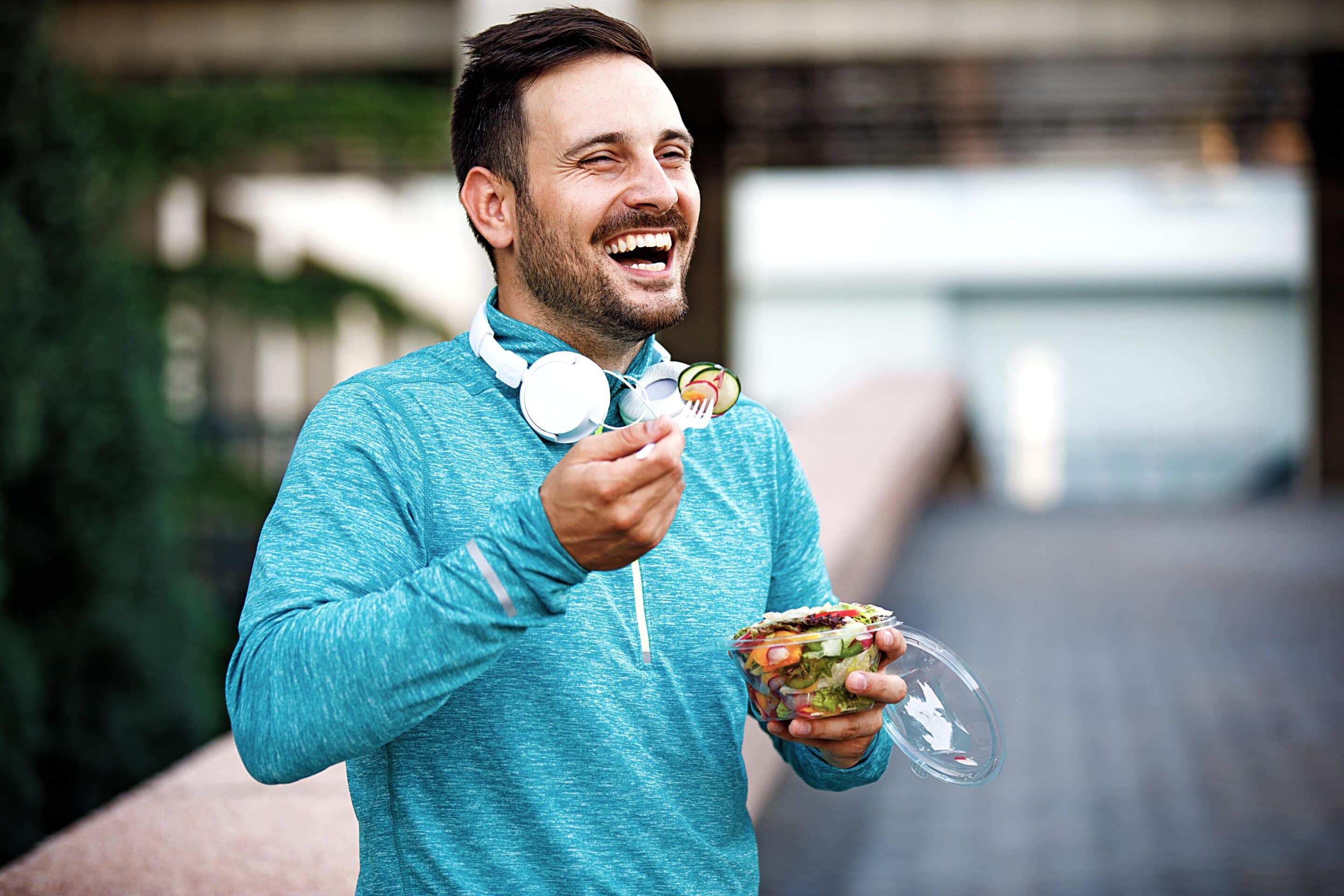 January Man getting some fresh air while eating healthy lunch