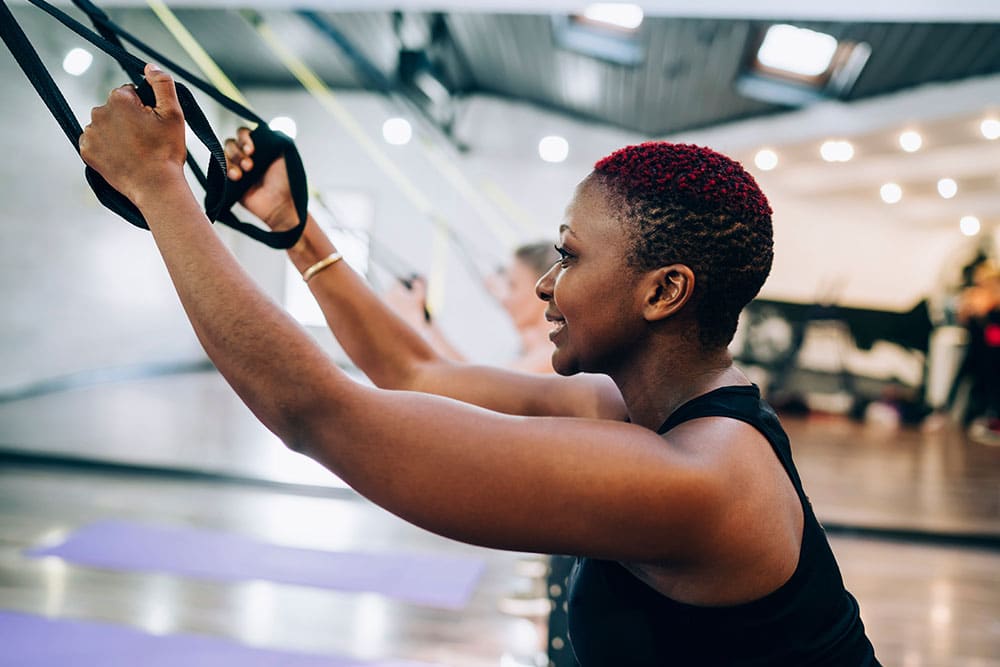 Person exercising to help manage symptoms of hormonal changes